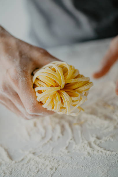 istock Chef making traditional italian homemade pasta 970224308