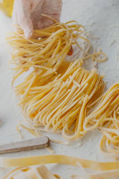 istock Chef making traditional italian homemade pasta 970224312