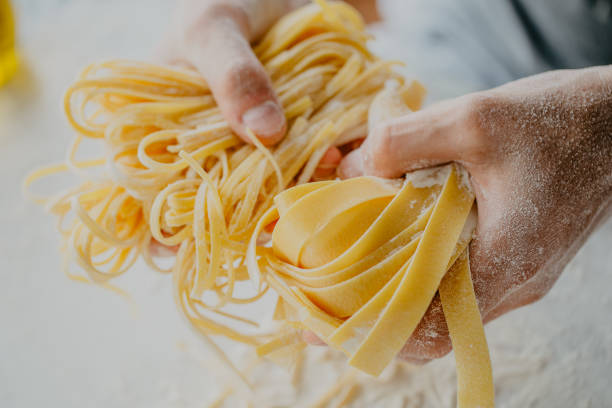 istock Chef making traditional italian homemade pasta 970224596