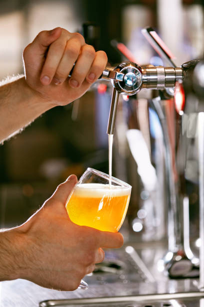 istock Draught Beer. Closeup Pouring Fresh Beer In Glass 970228422