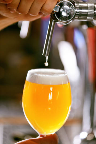 istock Draught Beer. Closeup Pouring Fresh Beer In Glass 970228628