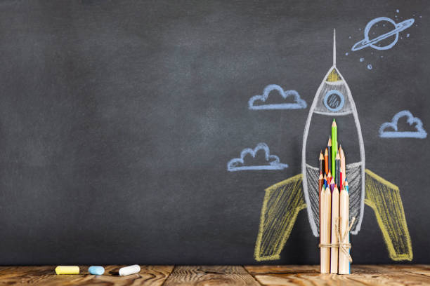 istock Back to School Concept with Hand Drawn Rocket on Blackboard 970232868