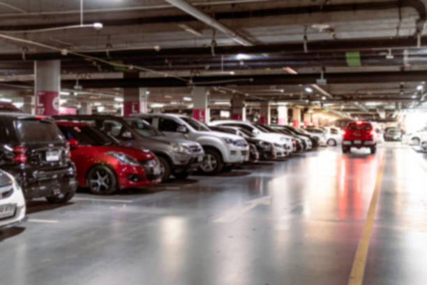 istock Blurred image Parking garage In the mall for background. 970232930