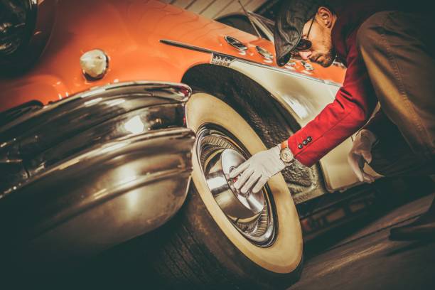 istock Classic Car Buyer Inspection 970233808