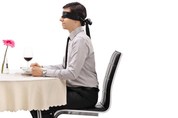 Elderly man as a digital twin looks at his mirror image and toasting