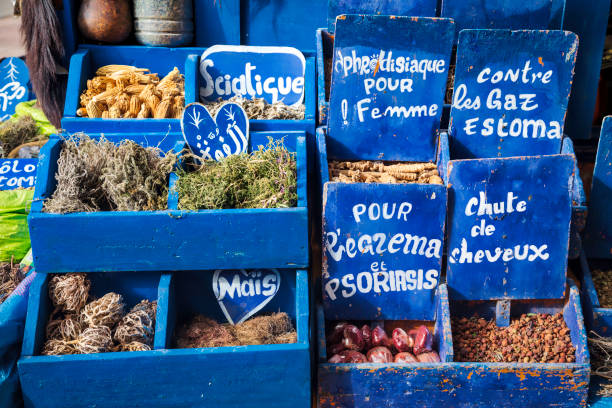 Colorful different dried natural fruit tea in blue and red bags on local market in Marrakesh medina.Textured arabian style background.