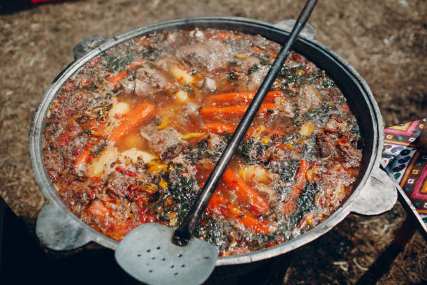 istock Shurpa soup in a large cauldron outdoor 970249438