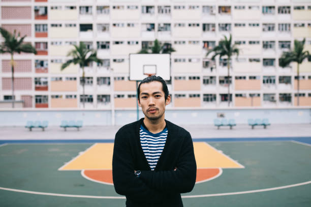 istock Guy standing on a basketball court. 970253520