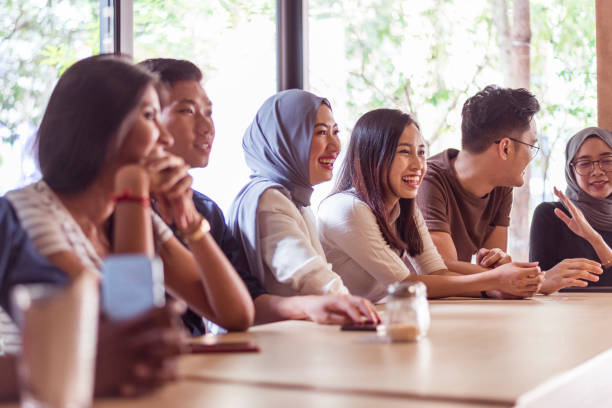 istock Young Asian friends in cafe 970262540
