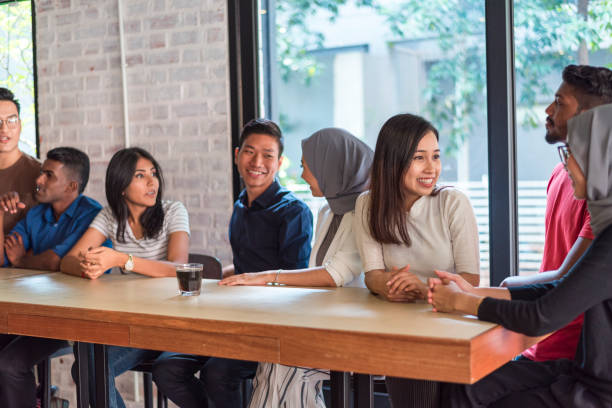 istock Young Asian friends in cafe 970262576