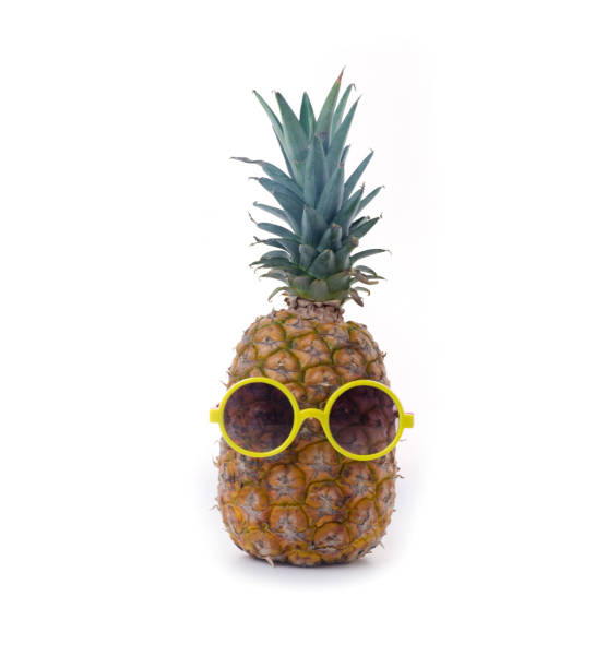 istock A pineapple in a dark mirror on a white background 970267610