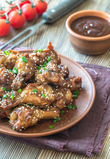 istock Chicken teriyaki wings with barbecue sauce 970270264