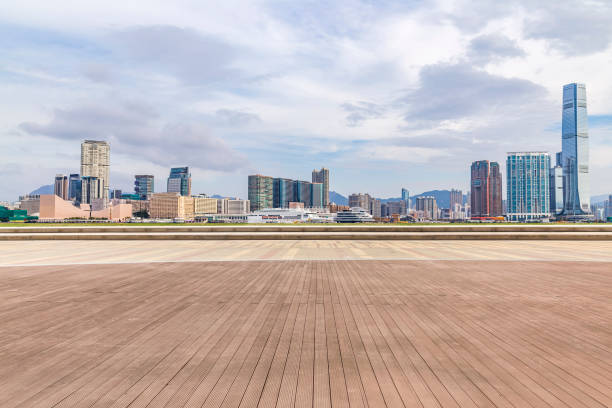 istock Panoramic skyline and modern business office buildings with empty road,empty concrete square floor 970270534