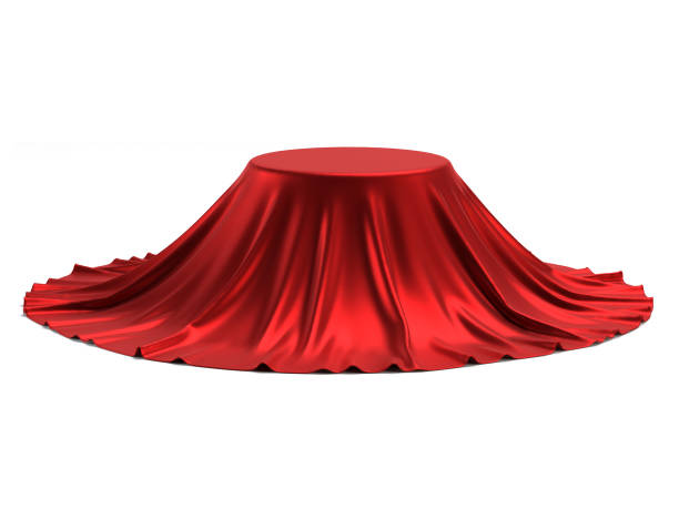 istock Round podium covered with red fabric isolated on white background 970271414