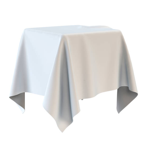 istock Podium covered with white sheet isolated on white background 970271502