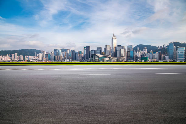 istock Panoramic skyline and modern business office buildings with empty road,empty concrete square floor 970271996