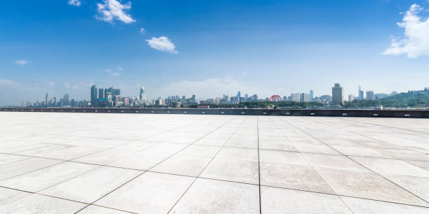 istock Panoramic skyline and modern business office buildings with empty road,empty concrete square floor 970272366