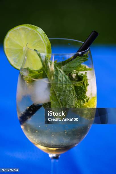 Hugo Summer Cocktail On Blue Background Stock Photo - Download Image Now - Alcohol - Drink, Aperitif, Appetizer