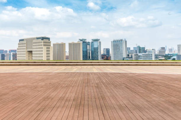 istock Panoramic skyline and modern business office buildings with empty road,empty concrete square floor 970281214
