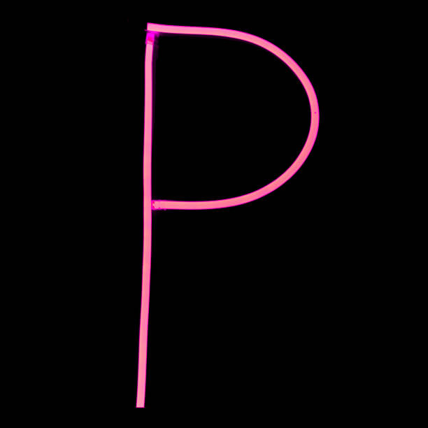 istock Alphabet pink neon lights on black background 970281268