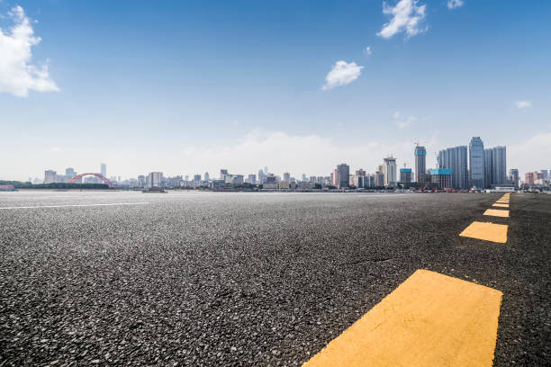 istock Panoramic skyline and modern business office buildings with empty road,empty concrete square floor 970281368