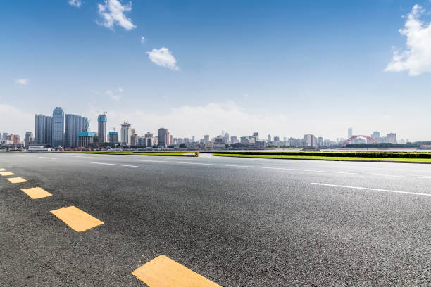istock Panoramic skyline and modern business office buildings with empty road,empty concrete square floor 970281418