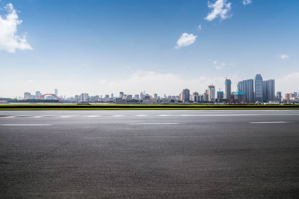 istock Panoramic skyline and modern business office buildings with empty road,empty concrete square floor 970281516