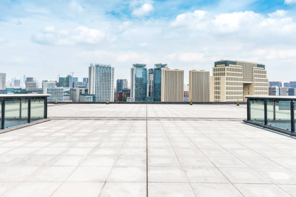 istock Panoramic skyline and modern business office buildings with empty road,empty concrete square floor 970281652