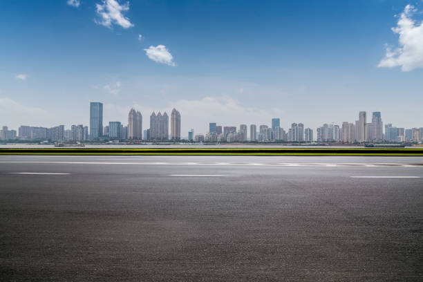 istock Panoramic skyline and modern business office buildings with empty road,empty concrete square floor 970286926