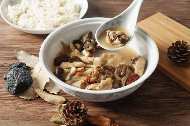 istock A nutritious chicken soup with a woody background 970286958