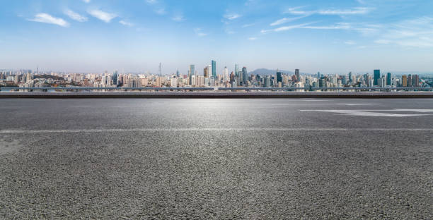 istock Panoramic skyline and modern business office buildings with empty road,empty concrete square floor 970288978
