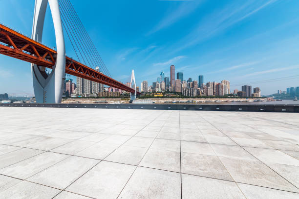 istock Panoramic skyline and modern business office buildings with empty road,empty concrete square floor 970291684