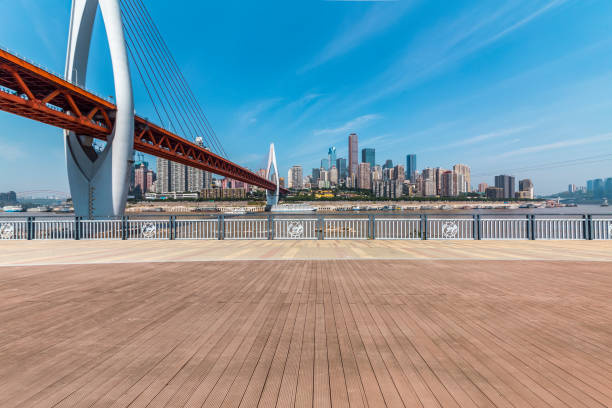 istock Panoramic skyline and modern business office buildings with empty road,empty concrete square floor 970292480