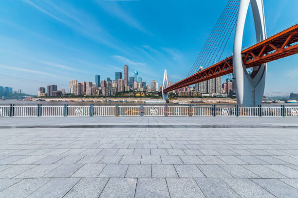istock Panoramic skyline and modern business office buildings with empty road,empty concrete square floor 970292562