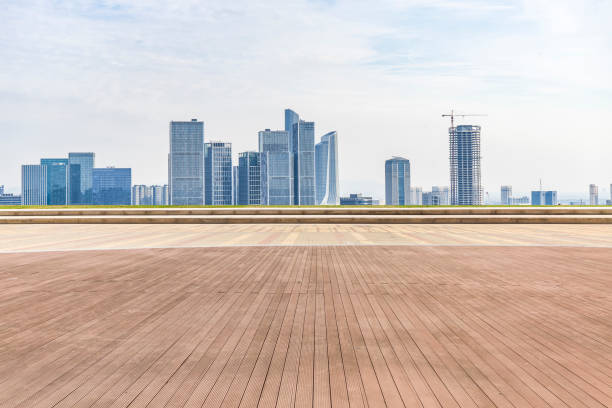 istock Panoramic skyline and modern business office buildings with empty road,empty concrete square floor 970293554