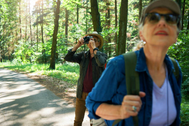 istock active seniors hiking and enjoying the nature 970293790