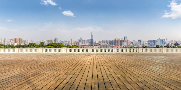 istock Panoramic skyline and modern business office buildings with empty road,empty concrete square floor 970295418