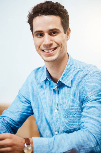 istock Smiling young man looks confident 970296306