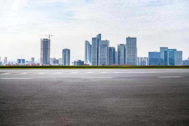 istock Panoramic skyline and modern business office buildings with empty road,empty concrete square floor 970296630