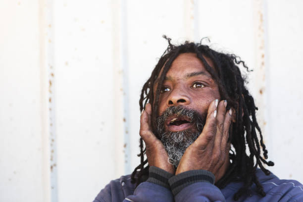 istock Homeless man sees something that provokes anxiety 970297850