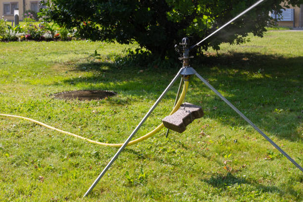 istock spinkle equipment on a green lawn 970298480