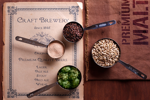 Home brew beer ingredients.\nBackground illustration is my own artwork made for the image.