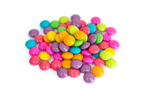 istock colorful chocolate coated candy isolated on white background 970304854