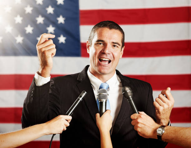 istock Journalists with microphones mob American politician 970305770