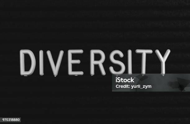 Word Diversity Written On The Letter Board Stock Photo - Download Image Now - Multiculturalism, Aspirations, Black Color