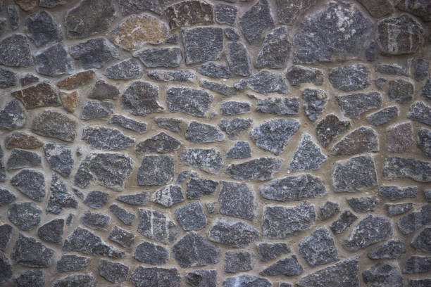 istock Stone pavement texture. Granite cobblestoned background. 970319648