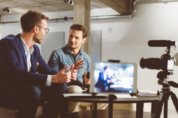 istock Video bloggers recording content on camera 970322876
