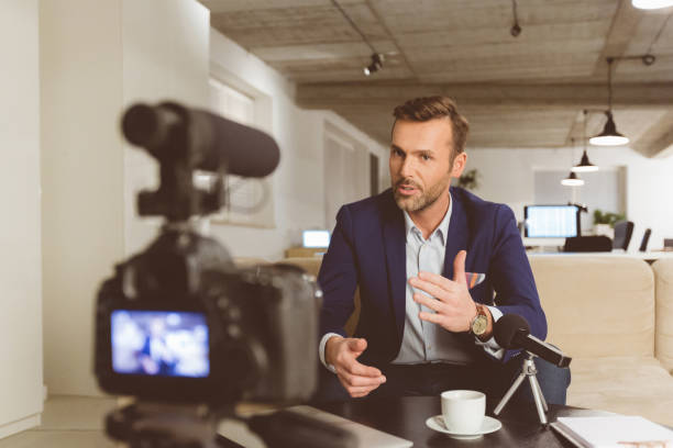 istock Businessman making a video blog 970324544