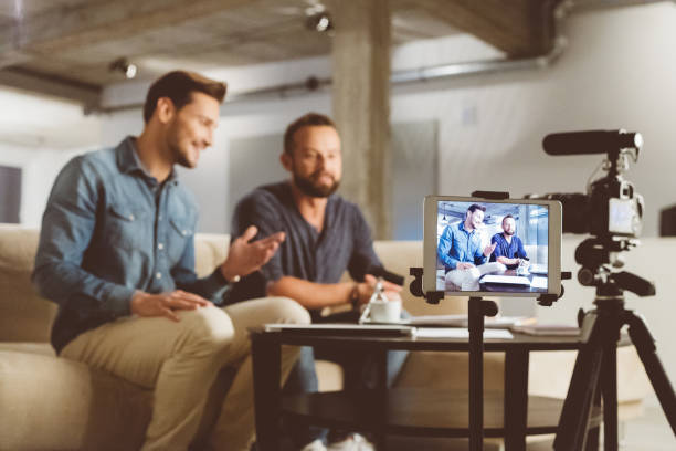 istock Two male video blogger 970345878