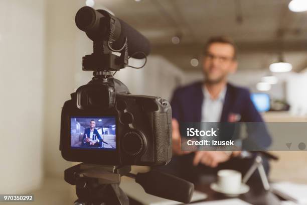 Vlogger Recording Content On Camera Stock Photo - Download Image Now - Social Media, Camera - Photographic Equipment, Vlogging